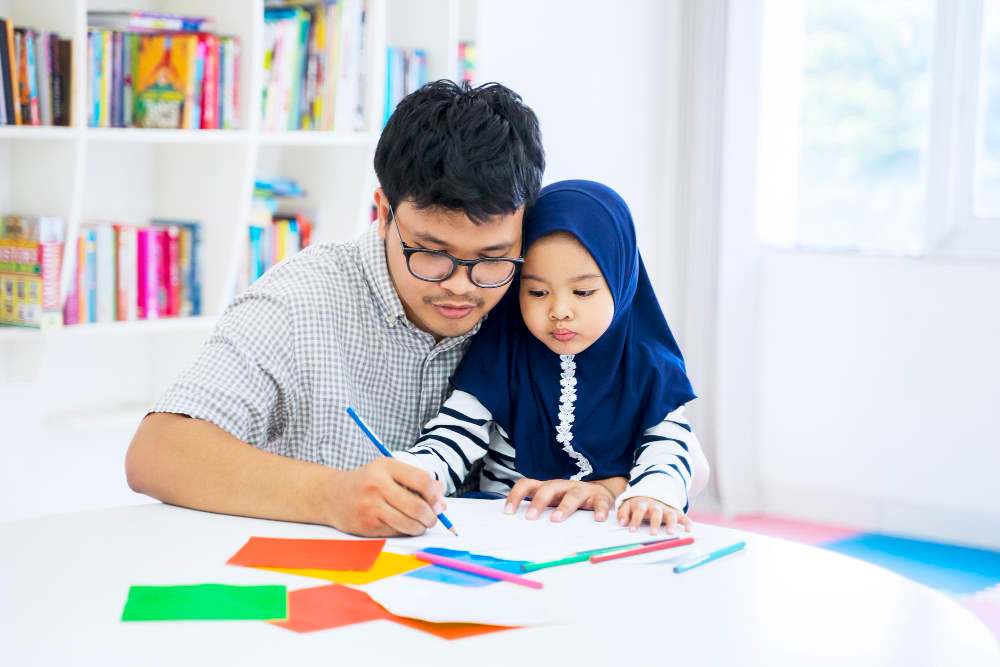 A father teaching his little student daughter